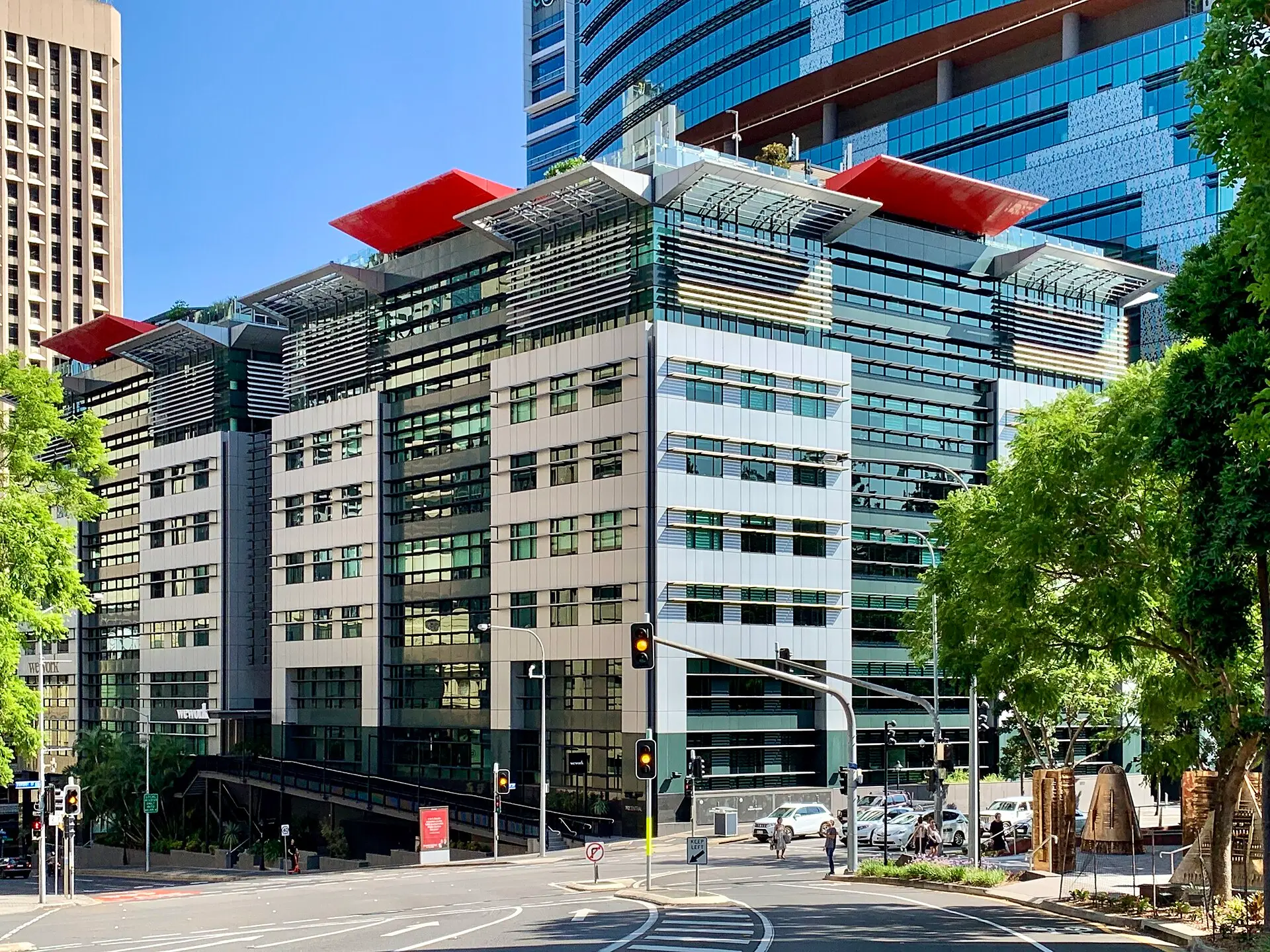 Brisbane CBD office buildings and street trees on a sunny weekday