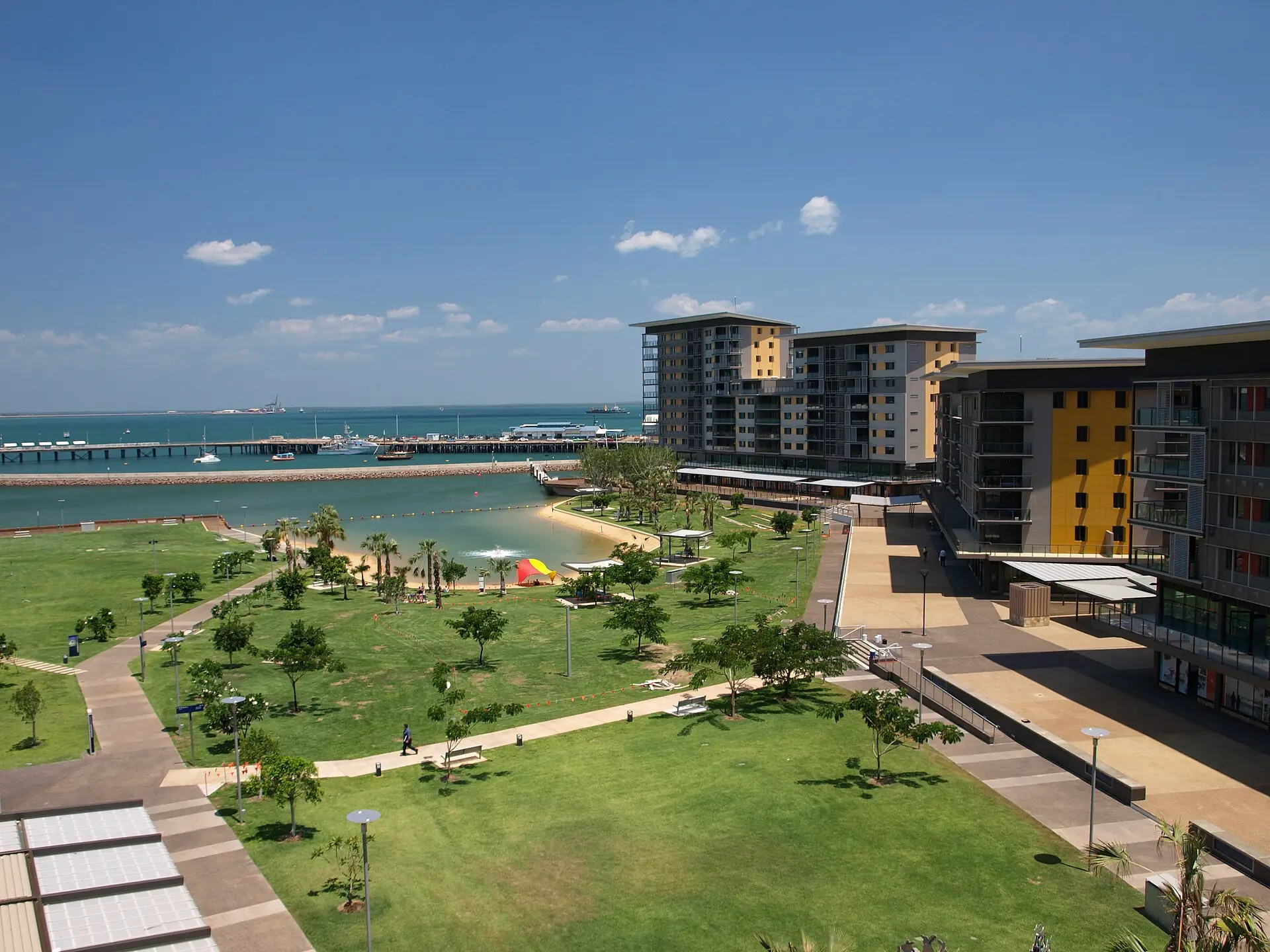 Darwin Waterfront precinct apartments, lawns and lagoon beside the harbour