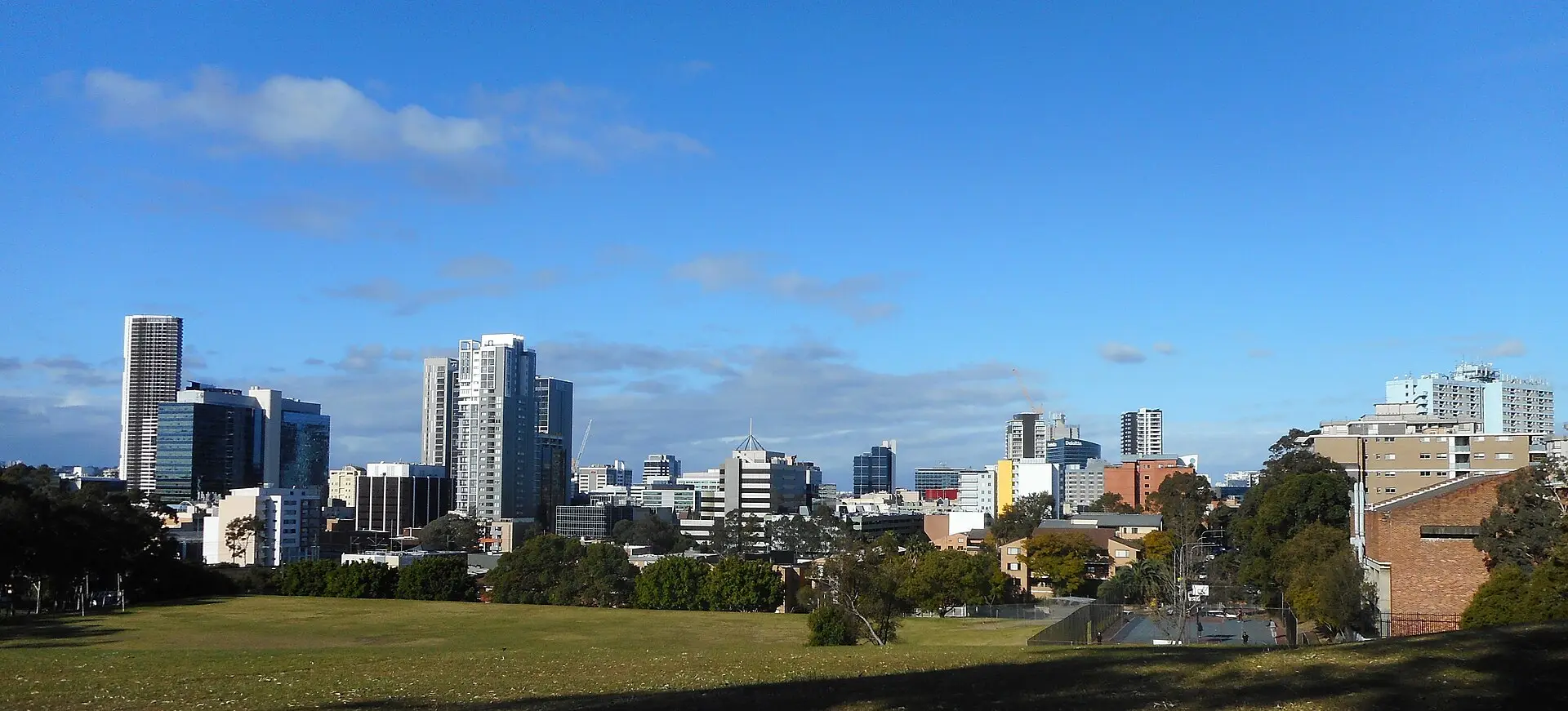 Parramatta CBD apartment and office towers seen from a park in western Sydney